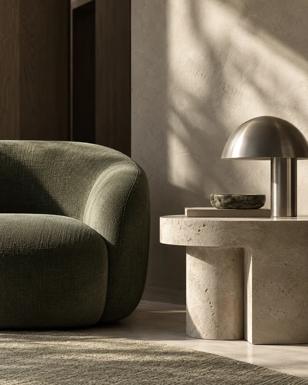 AI-generated concept: a moss-green chair beside a limestone table.